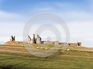 Dunstanburgh Castle on the Northumberland coast with copy space