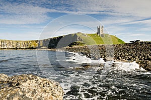 Dunstanburgh Castle with sea