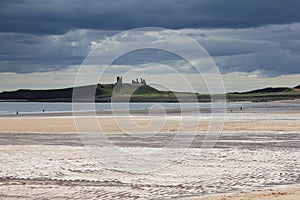 Dunstanburgh Castle with stormy skies 1