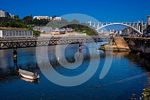 Duoro River and the Cais das Pedras Viaduct in a beautiful early spring day at Porto City in Portugal