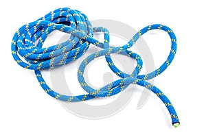 durable colored rope for climbing equipment on a white background. knot of braided cable. item for tourism and travel