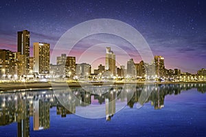 Durban city beachfront buildings lit up at night