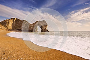 Durdle Door arch in Southern England on a sunny day