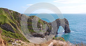 Durdle Door, one of the Jurassic Coast`s most iconic landscapes during summer season