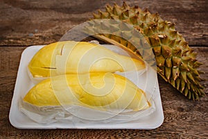 Durian on a wooden background.