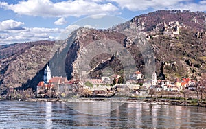 Durnstein village during spring time with ruin of castle on the rock over Danube river in Wachau, Austria