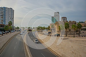 DURRES, ALBANIA: View of the highway and the ancient Venetian Tower in the historical center of Durres.
