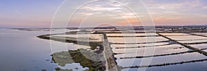 Dusk aerial panoramic seascape view of Olhao salt marsh Inlet.