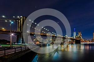 Dusk at Brooklyn Bridge and Lower Manhattan Skyline, New York Un