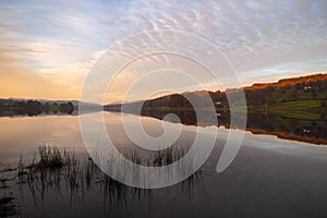 Dusk at Esthwaite Water and reflections of clouds in mackerel sky, Lake District