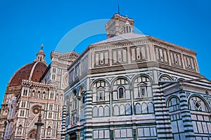 Dusk falls over the Baptistery of St. John and Florence Cathedral consecrated in 1436