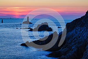 Dusk over Brittany rocky coastline