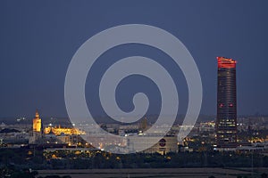 Dusk in Seville with the Giralda and the Pelli Tower. Night