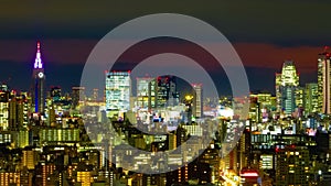 A dusk time lapse of cityscape in Tokyo high angle long shot