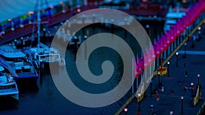 A dusk timelapse of miniaature bay area at Darling harbour in Sydney high angle tiltshift zoom