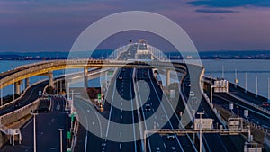 A dusk timelapse of traffic jam on the highway at Tokyo bay area in Chiba zoom