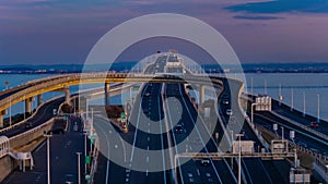 A dusk timelapse of traffic jam on the highway at Tokyo bay area in Chiba zoom