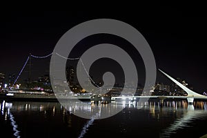 Dusk and Woman Bridge on Puerto Madero neighborghood or disctrict in Buenos Aires city, Argentina