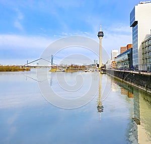 Dusseldorf in a sunny summer day with river reflection