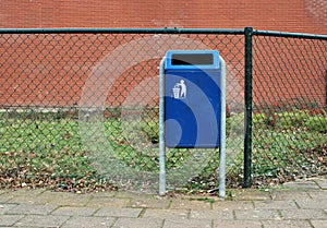 Dust bin or trash can in a Dutch street