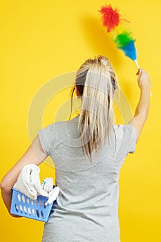 Dust cleaning woman backview feather duster cloths