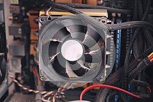 Dust on CPU cooling fan inside of a PC computer