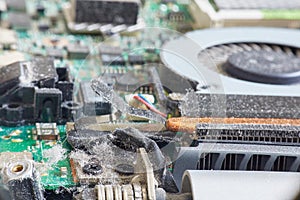 Dust on electronic parts in a laptop or computer close-up