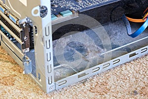 Dust and hair inside an untidy computer case