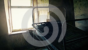 Dust Swirls In Old Bedroom In Abandoned House