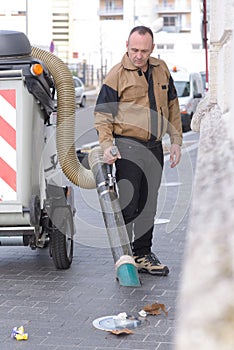 dustman cleans street photo