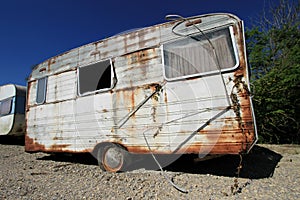 Dusty abandonned old caravan