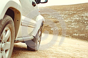 dusty car, road dust on the car close-up