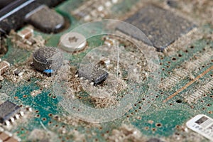 Dusty circuit board from hard drives - series of computer parts