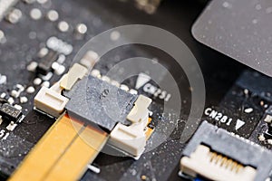 dusty connector and cable of the electronic device. Repair and Refurbishment. photo