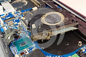 Dusty fan inside the laptop during servicing