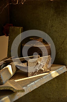 Dusty grungy unusable objects in the workshop.