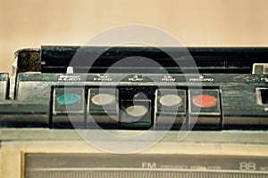 Dusty old radio with one cassette player