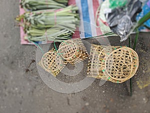 Dusunic people tool for fish trapping made of bamboo and rattan sale on local marketplace located in Sabah, Malaysia