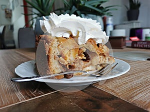 Dutch apple pie with whipped cream