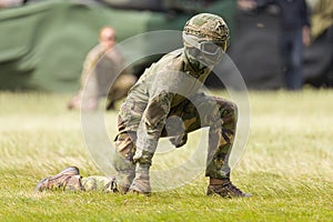 A Dutch army forward observer waiting for the helicopter to land