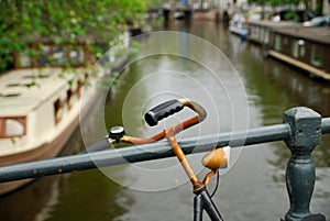 Dutch bicycle and canal in Amsterdam