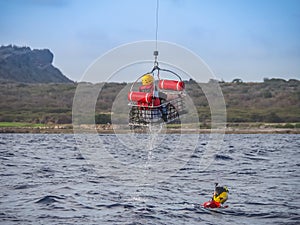 The Dutch Caribbean Coastguard - using a swim cage photo