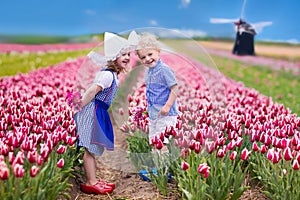 Dutch children in tulip field