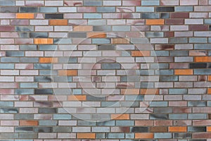 Dutch clinker dark bricks pattern in different tones of orange grey and red