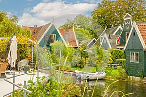Dutch Country Houses and a Pond with a Boat