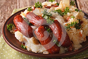 Dutch cuisine: stamppot from potatoes, sauerkraut and carrot close-up. horizontal photo