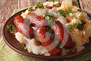 Dutch cuisine: stamppot from potatoes, sauerkraut and carrot close-up. horizontal