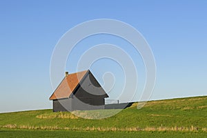 Dutch dike with Dutch dike shed