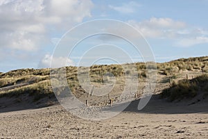 Dutch dunes with cloaded sky