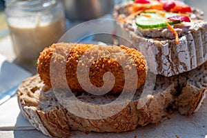 Dutch fast food, deep fried croquettes filled with ground beef meat served on bread